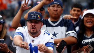 dallas-cowboys-fans-cheer-team-846798577.jpg